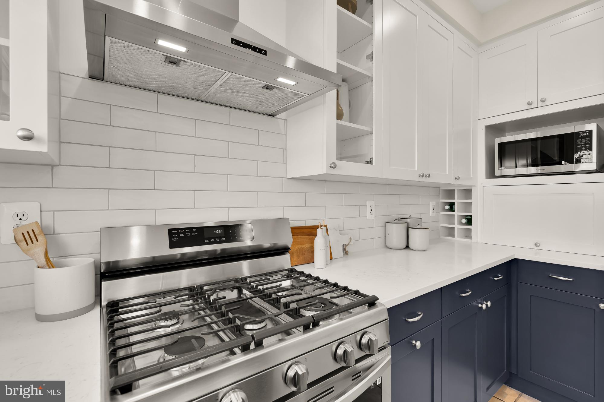 632 Acker Place Northeast Washington, DC 20002 - Photo 20 of 57 a kitchen with granite countertop a stove and a sink