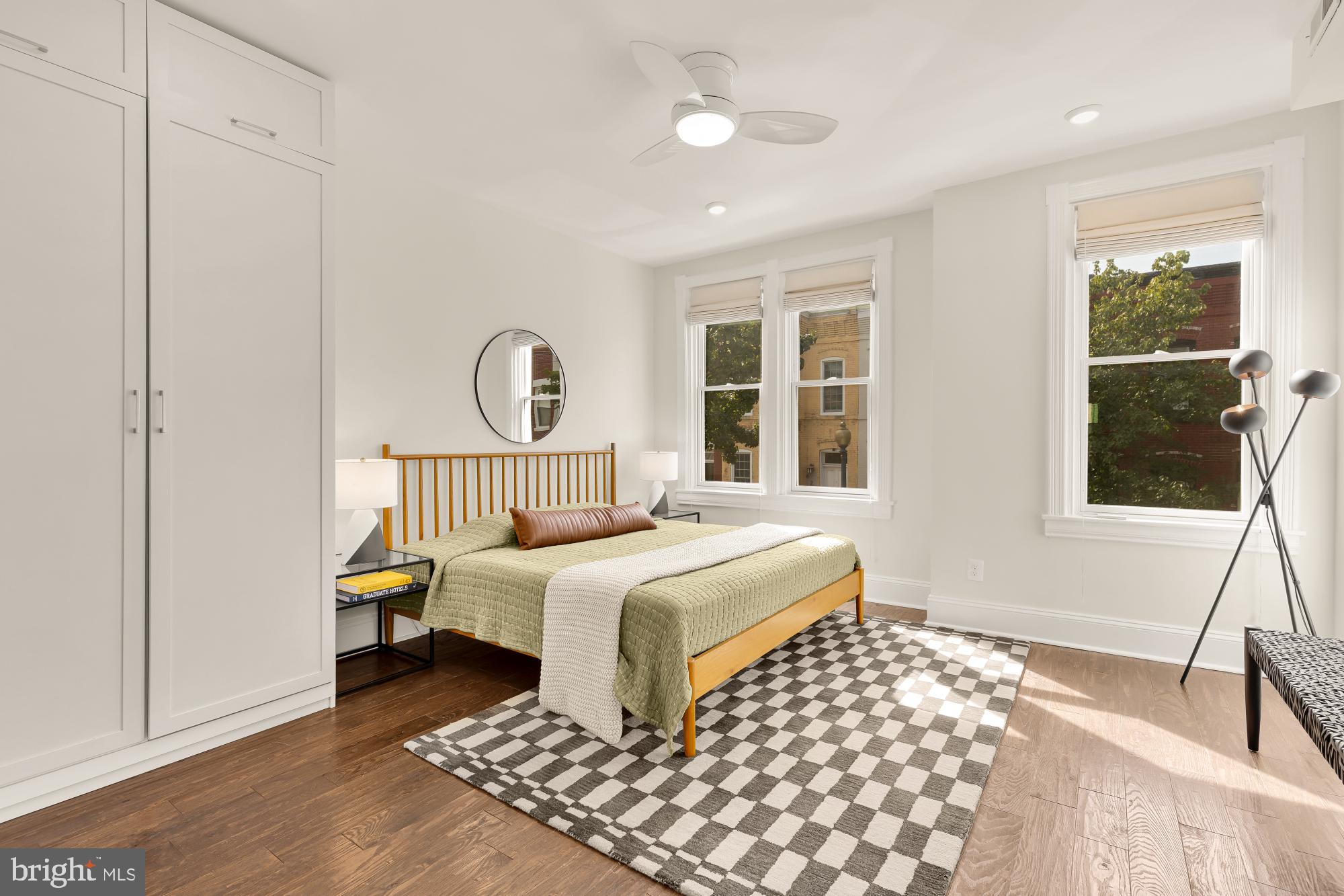 632 Acker Place Northeast Washington, DC 20002 - Photo 33 of 57 a bedroom with a bed and a large window