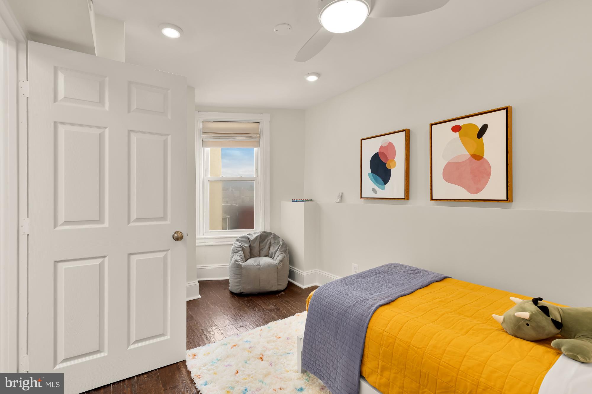 632 Acker Place Northeast Washington, DC 20002 - Photo 49 of 57 a bedroom with bed and a couch