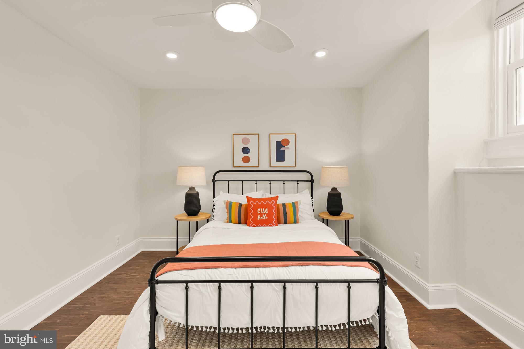 632 Acker Place Northeast Washington, DC 20002 - Photo 51 of 57 a bedroom with a bed and wooden floor