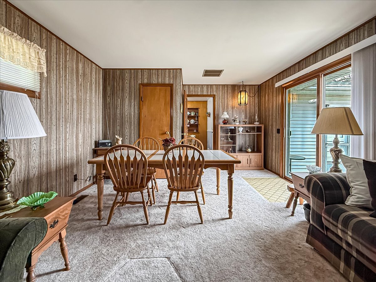 1612 Cornell Drive Champaign, IL 61821 - Photo 12 of 28 a living room with furniture and a lamp