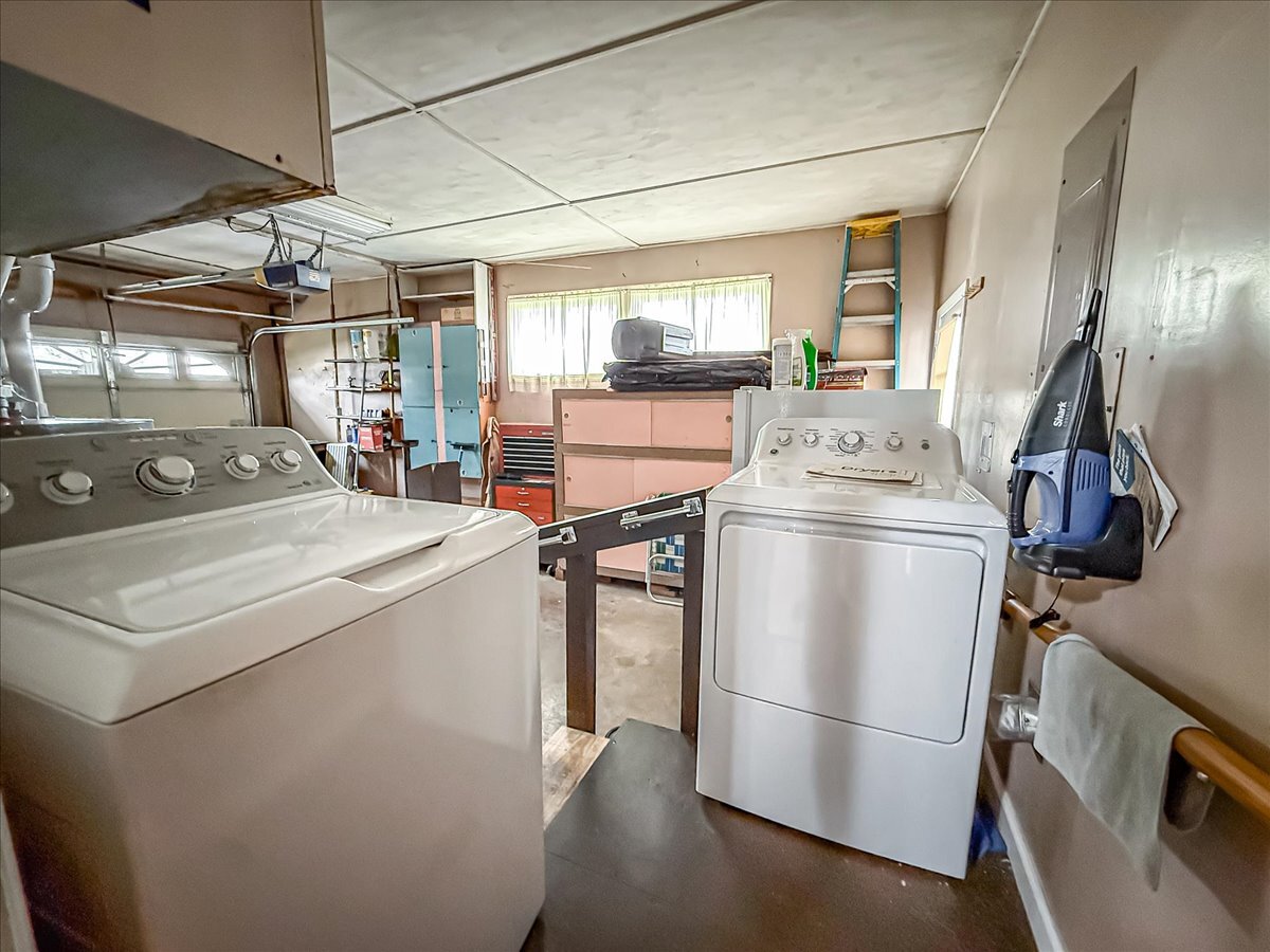 1612 Cornell Drive Champaign, IL 61821 - Photo 22 of 28 a utility room with dryer and washer