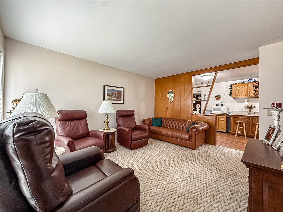1612 Cornell Drive Champaign, IL 61821 - Photo 4 of 28 a living room with furniture and a large window