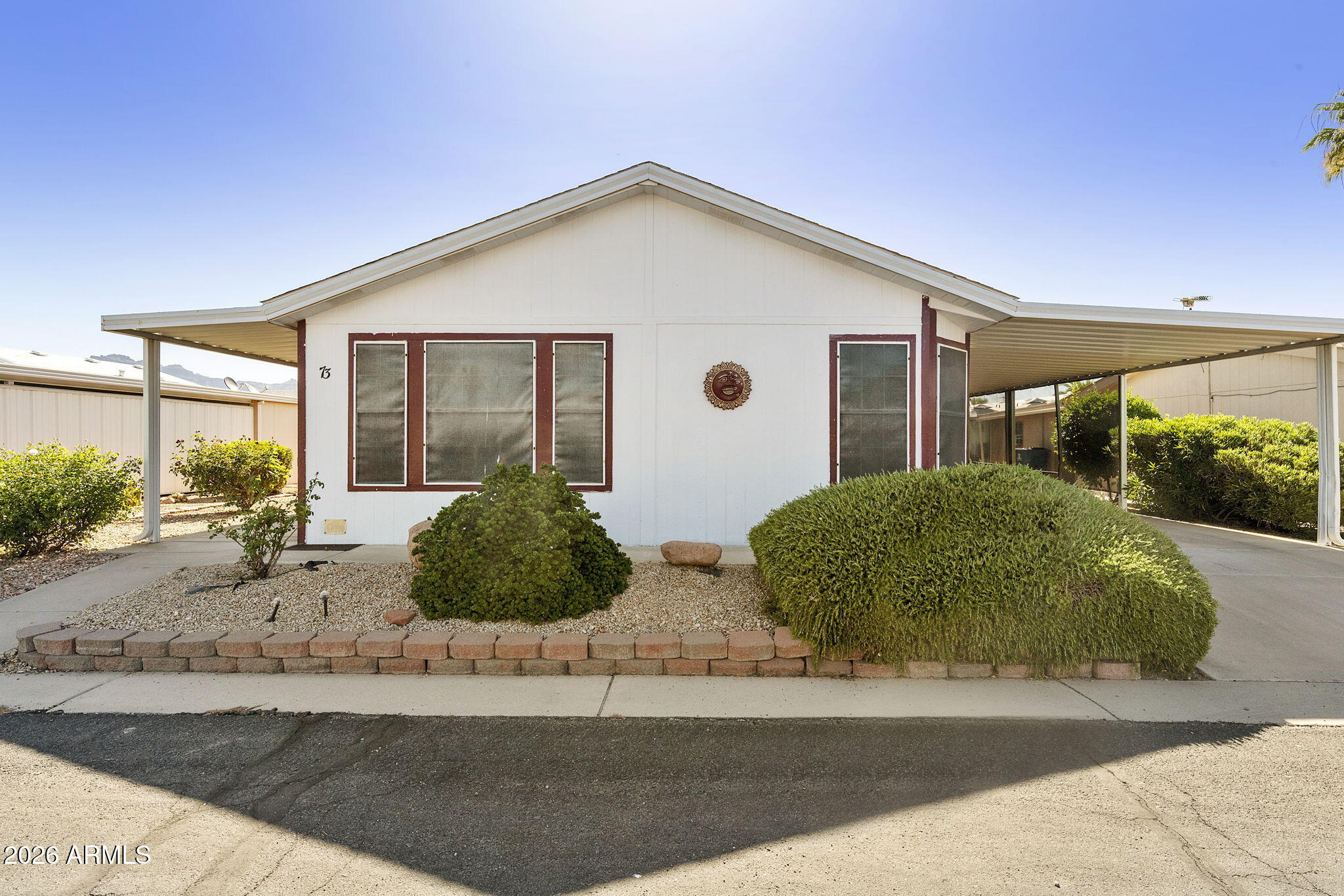 3700 South Tomahawk Road, Unit 73 Apache Junction, AZ 85119 - Photo 4 of 49 a view of a backyard