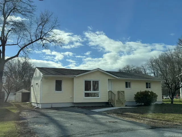 a view of a house with a patio