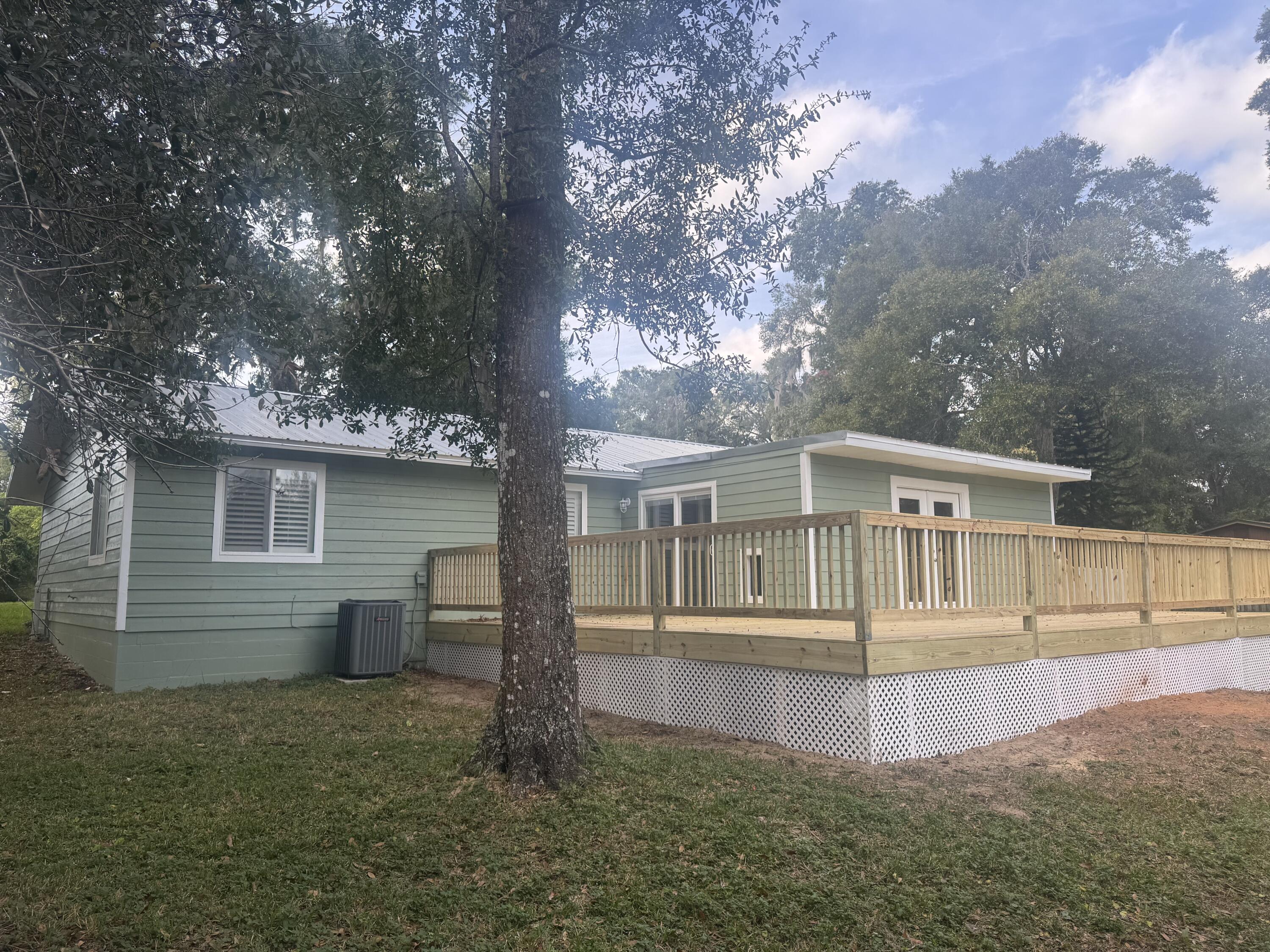271 Wisteria Road St. Augustine, FL 32086 - Photo 6 of 30 front view of a house with a yard