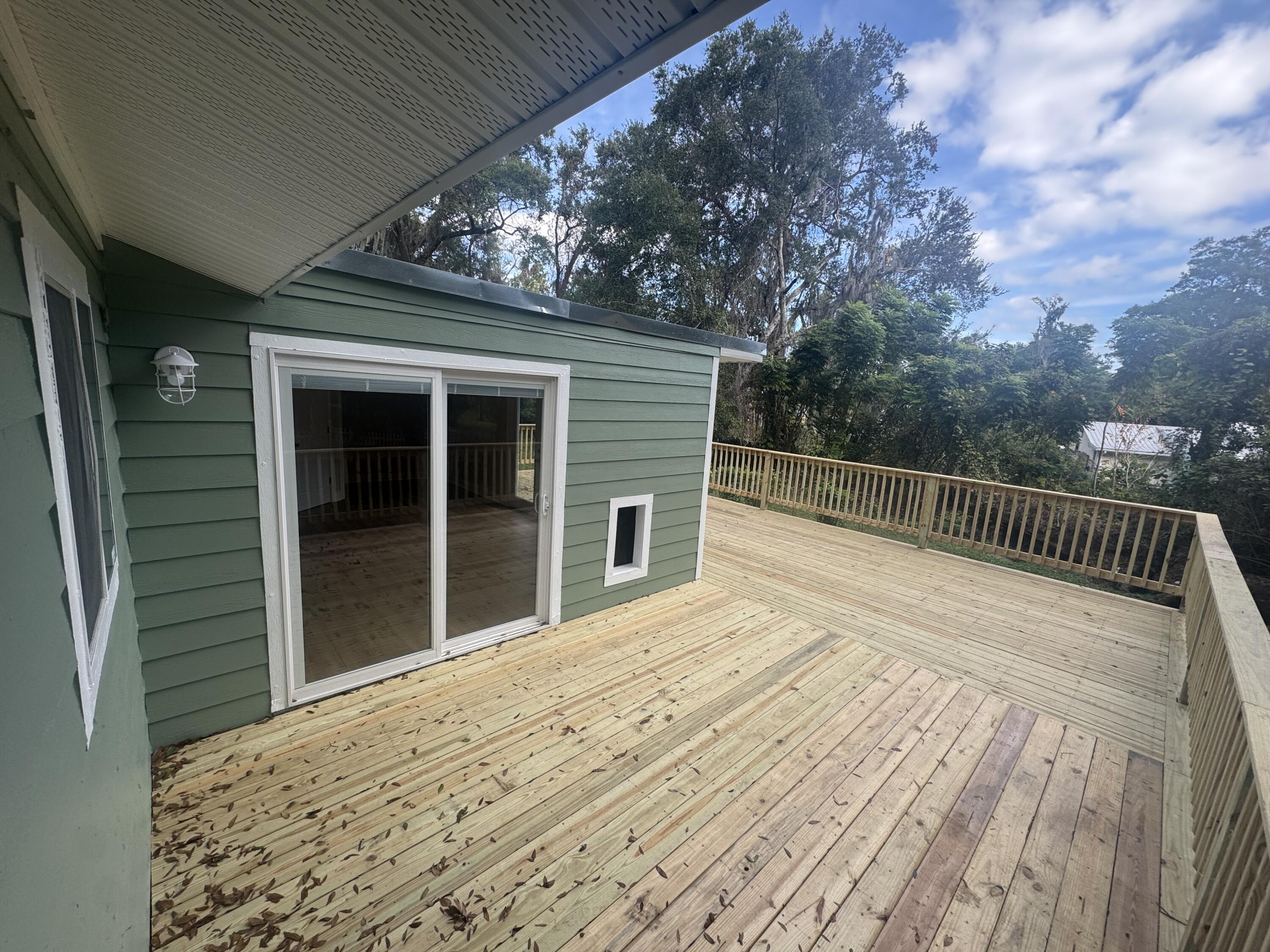 271 Wisteria Road St. Augustine, FL 32086 - Photo 8 of 30 a view of backyard with cabin