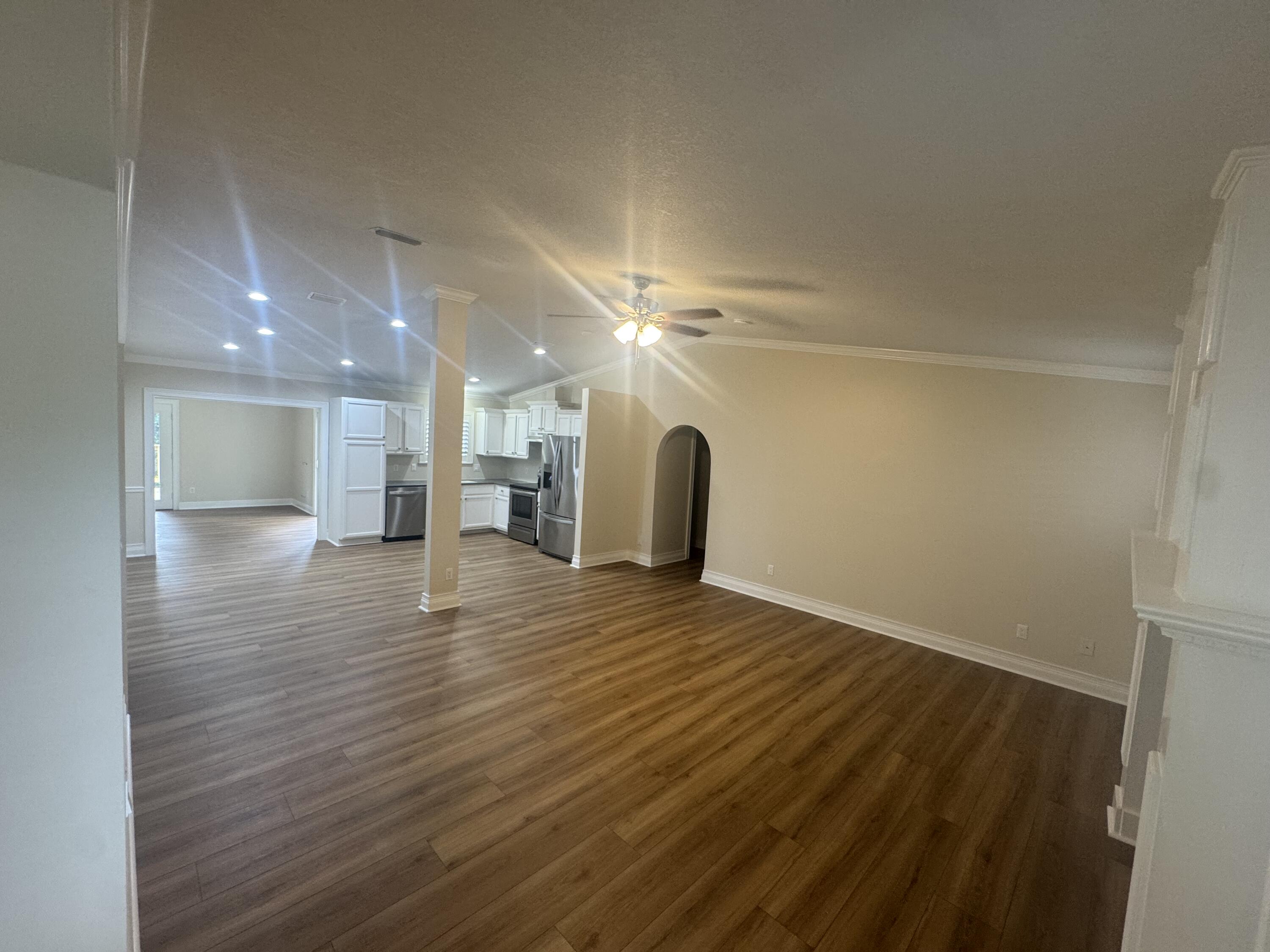 271 Wisteria Road St. Augustine, FL 32086 - Photo 9 of 30 a view of an empty room with wooden floor