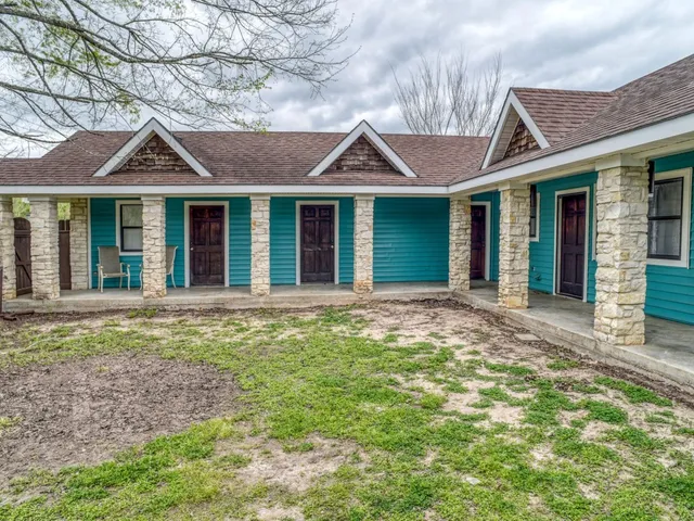 front view of a house with a yard