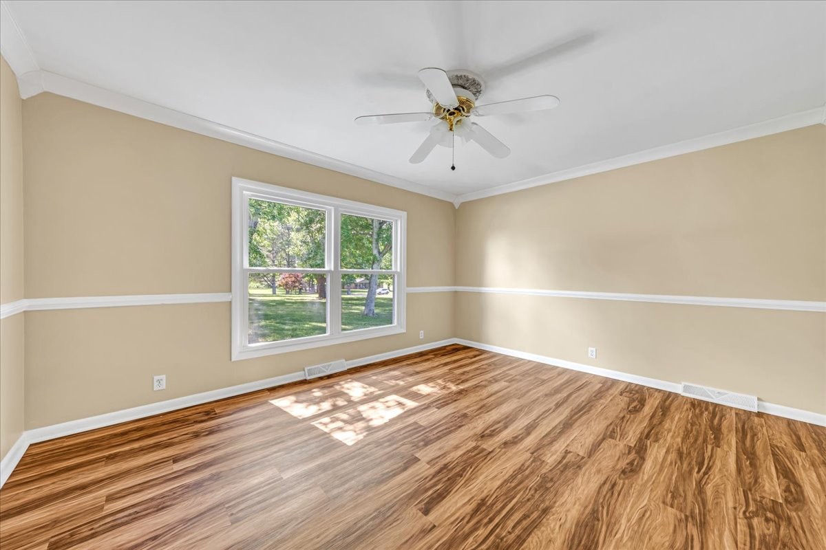 183 Prairie Plains Road Hillsboro, TN 37342 - Photo 23 of 63 a view of an empty room with wooden floor and a window
