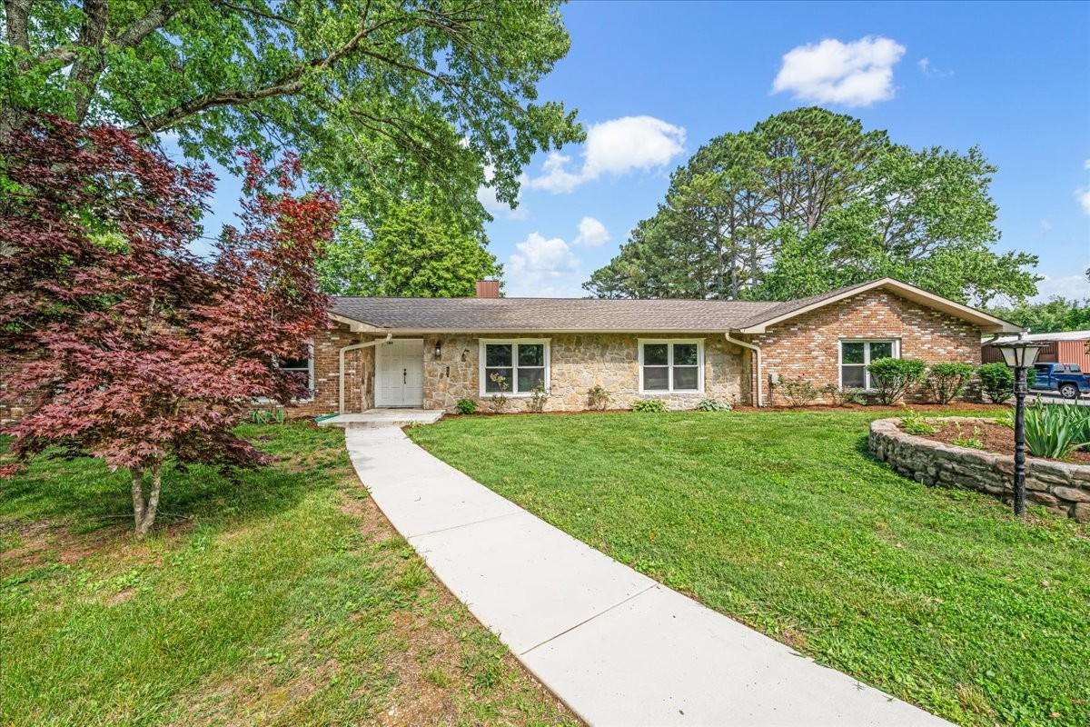 183 Prairie Plains Road Hillsboro, TN 37342 - Photo 3 of 63 a front view of house with yard and green space