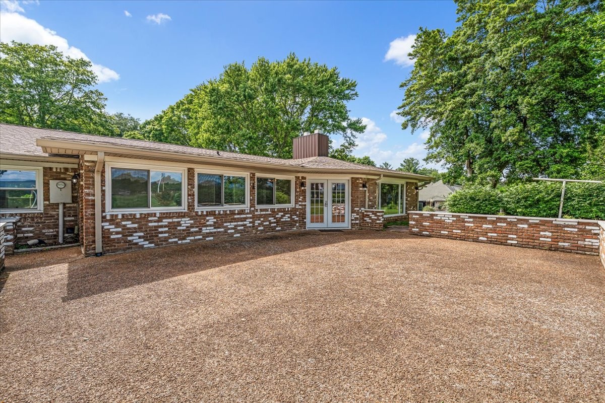183 Prairie Plains Road Hillsboro, TN 37342 - Photo 38 of 63 a view of a house with a yard and sitting area