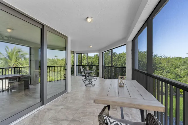 a view of a park with swings and slides