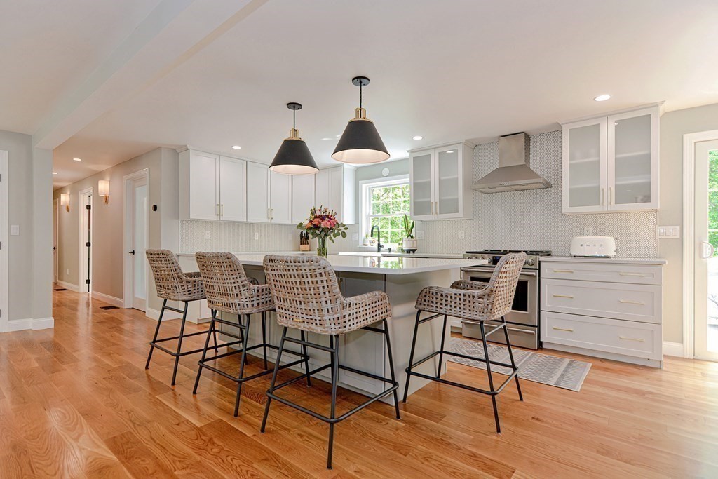 9 Woodcliff Road Canton, MA 02021 - Photo 11 of 42 a dining room with furniture and wooden floor
