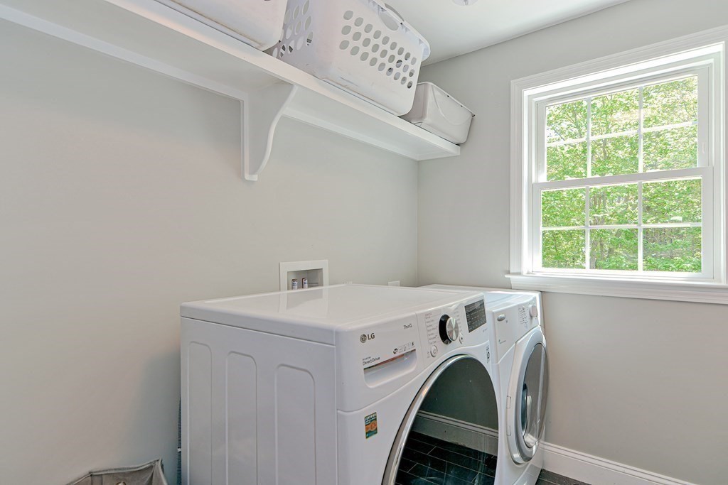 9 Woodcliff Road Canton, MA 02021 - Photo 13 of 42 a utility room with dryer and washer