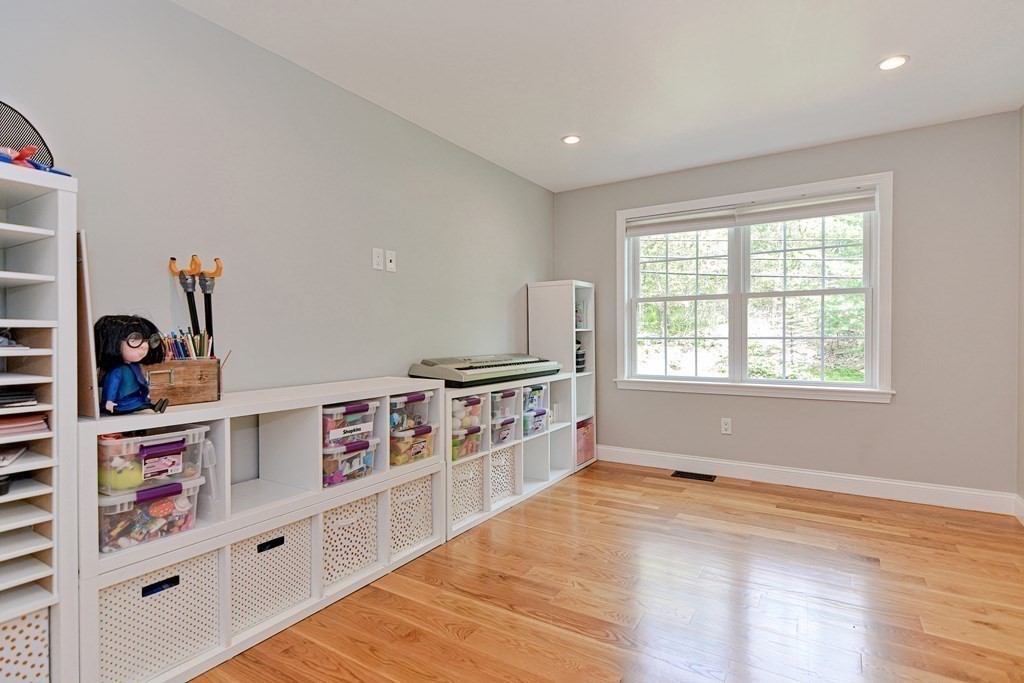 9 Woodcliff Road Canton, MA 02021 - Photo 19 of 42 an empty room with shelves