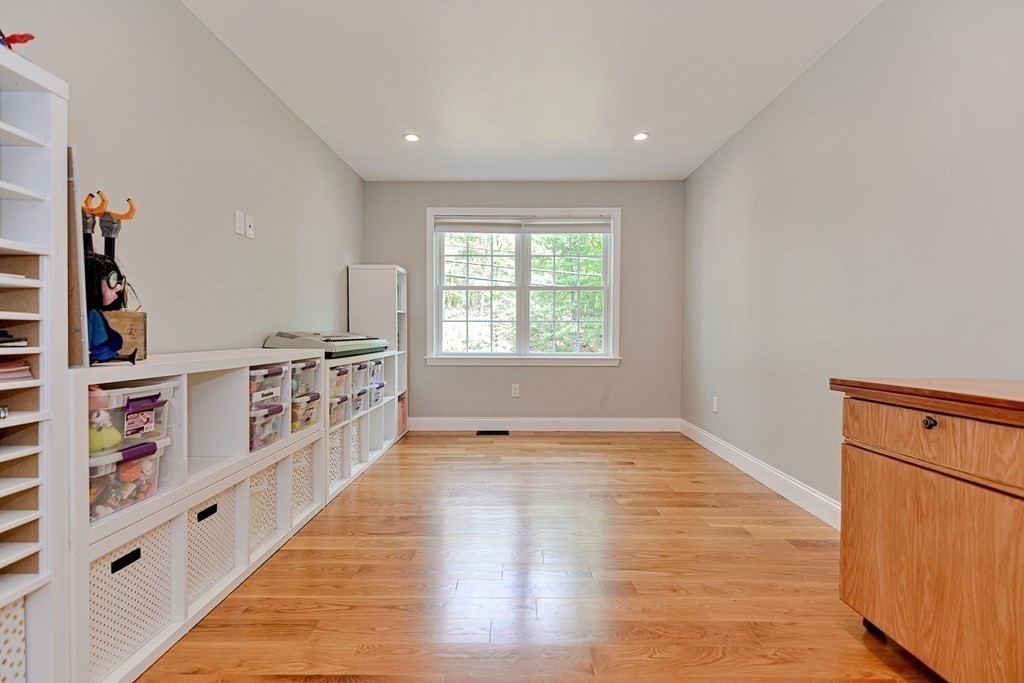 9 Woodcliff Road Canton, MA 02021 - Photo 20 of 42 a view of an empty room with shelves