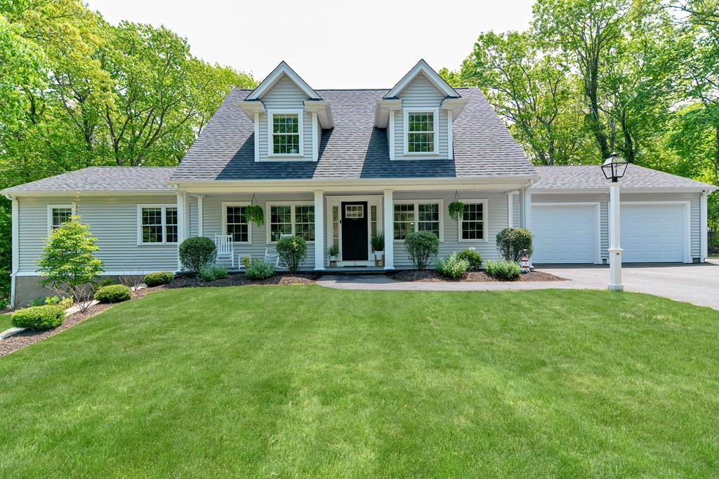 9 Woodcliff Road Canton, MA 02021 - Photo 2 of 42 front view of a house with a yard