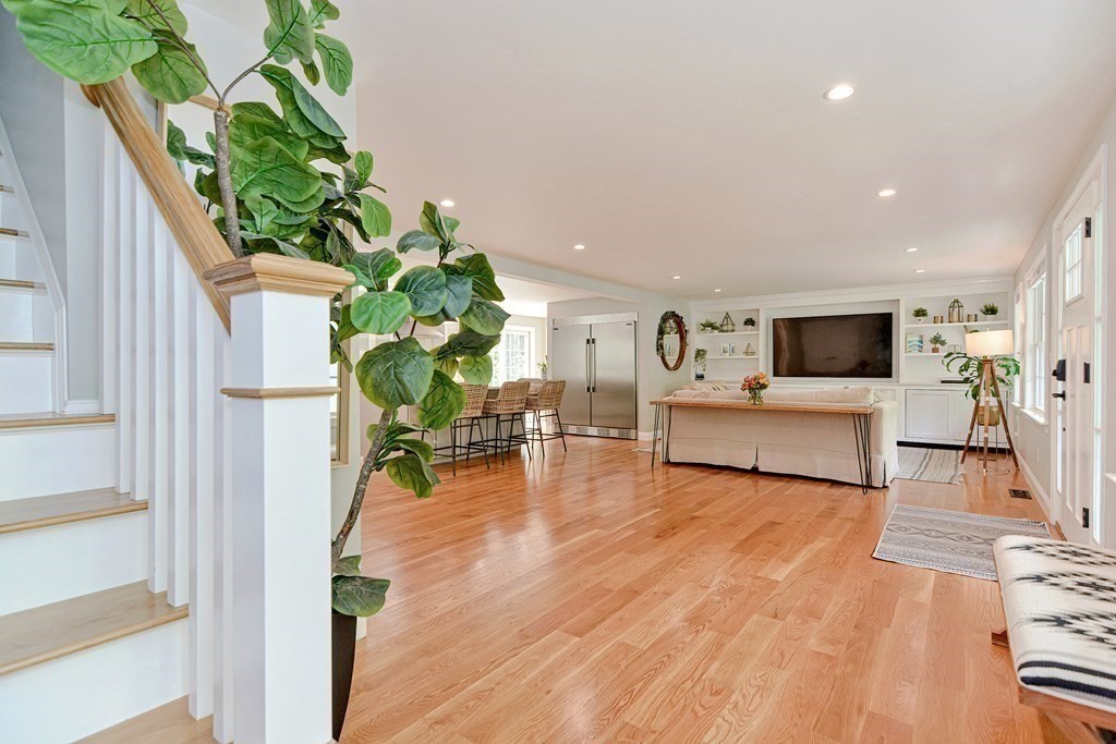 9 Woodcliff Road Canton, MA 02021 - Photo 25 of 42 a living room with furniture and a flat screen tv