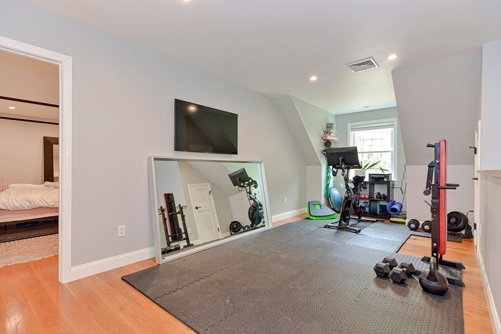9 Woodcliff Road Canton, MA 02021 - Photo 27 of 42 a view of a room with gym equipment