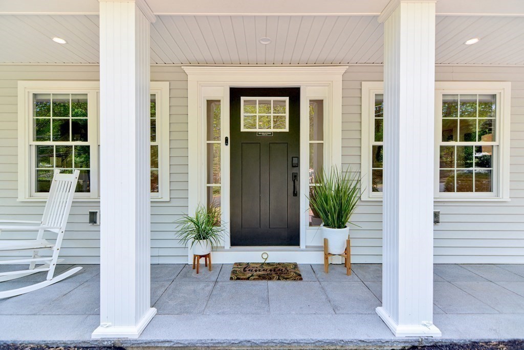 9 Woodcliff Road Canton, MA 02021 - Photo 3 of 42 a view of a entryway door front of house