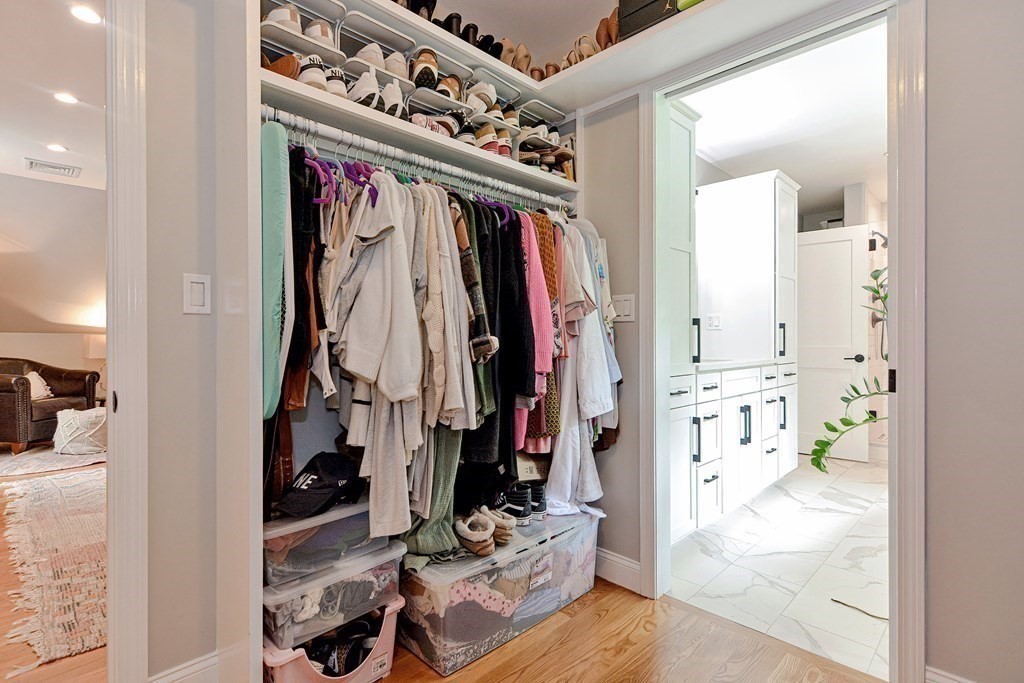9 Woodcliff Road Canton, MA 02021 - Photo 38 of 42 a view of walk in closet with clothes and shoes