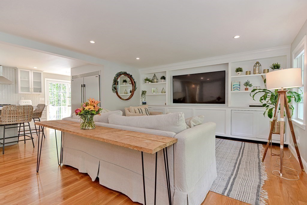 9 Woodcliff Road Canton, MA 02021 - Photo 6 of 42 a living room with furniture and a flat screen tv