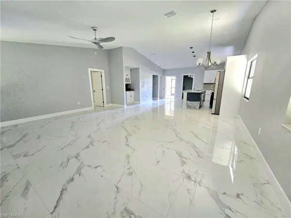 a view of a livingroom with a furniture