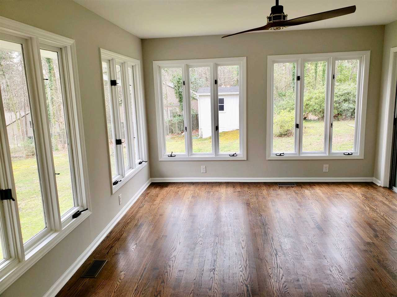 611 Wofford Road Durham, NC 27707 - Photo 18 of 30 Bright breezy place to relax with windows all around. Sunroom