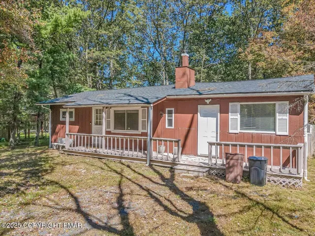 a front view of a house with a porch