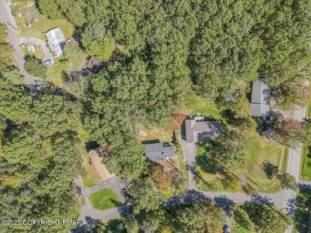 a view of a yard with an outdoor space