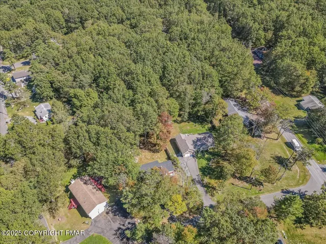 a view of a field with an outdoor space