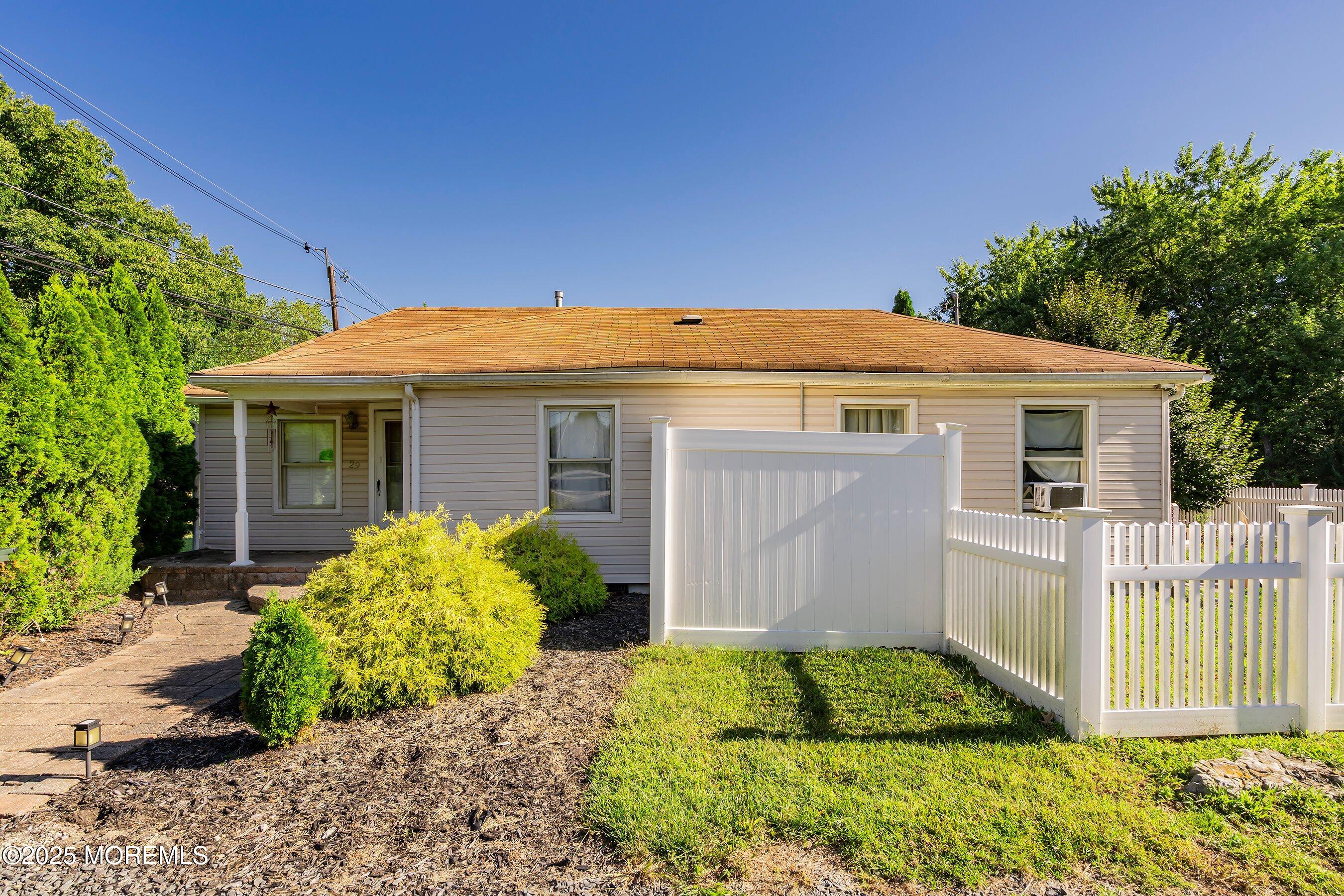 29 Ford Road Howell, NJ 07731 - Photo 1 of 19 front view of house with a yard