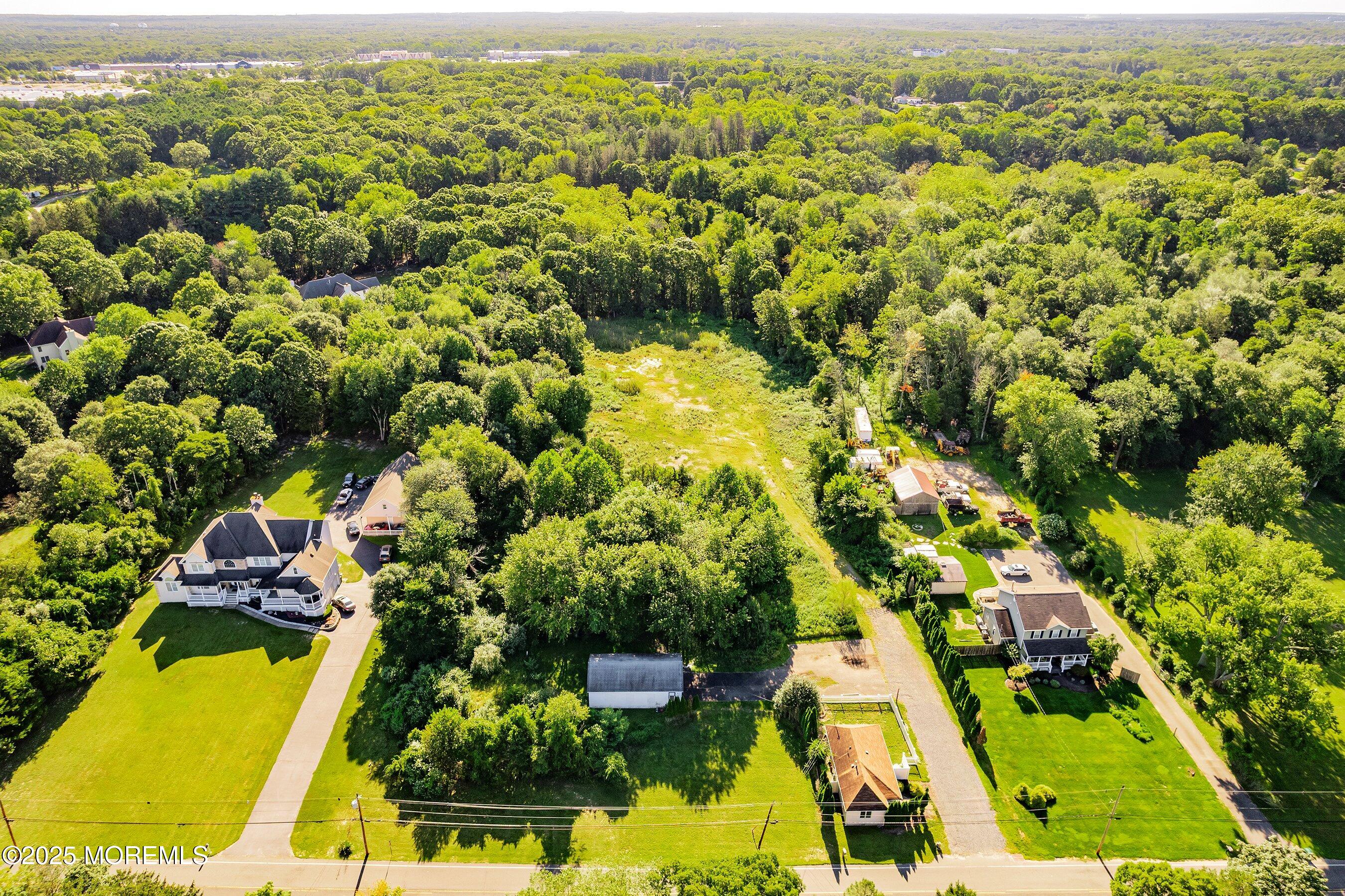29 Ford Road Howell, NJ 07731 - Photo 14 of 19 an aerial view of residential houses with outdoor space