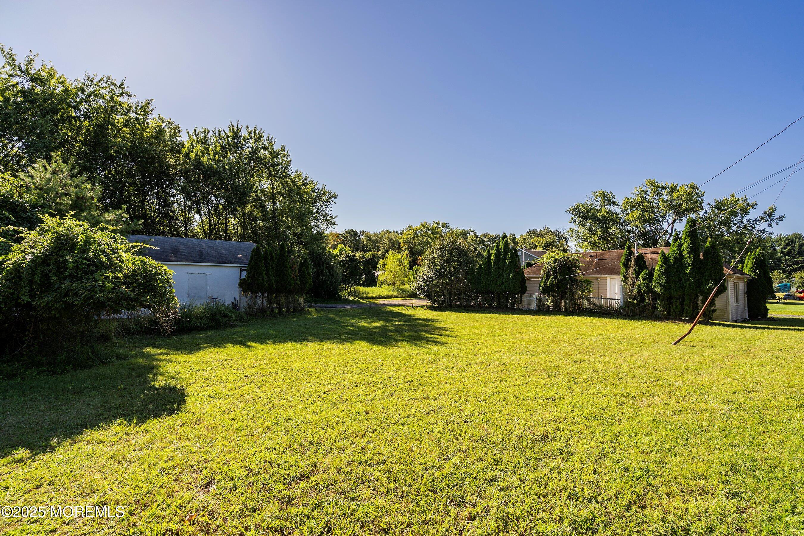 29 Ford Road Howell, NJ 07731 - Photo 19 of 19 a view of an outdoor space and swimming pool