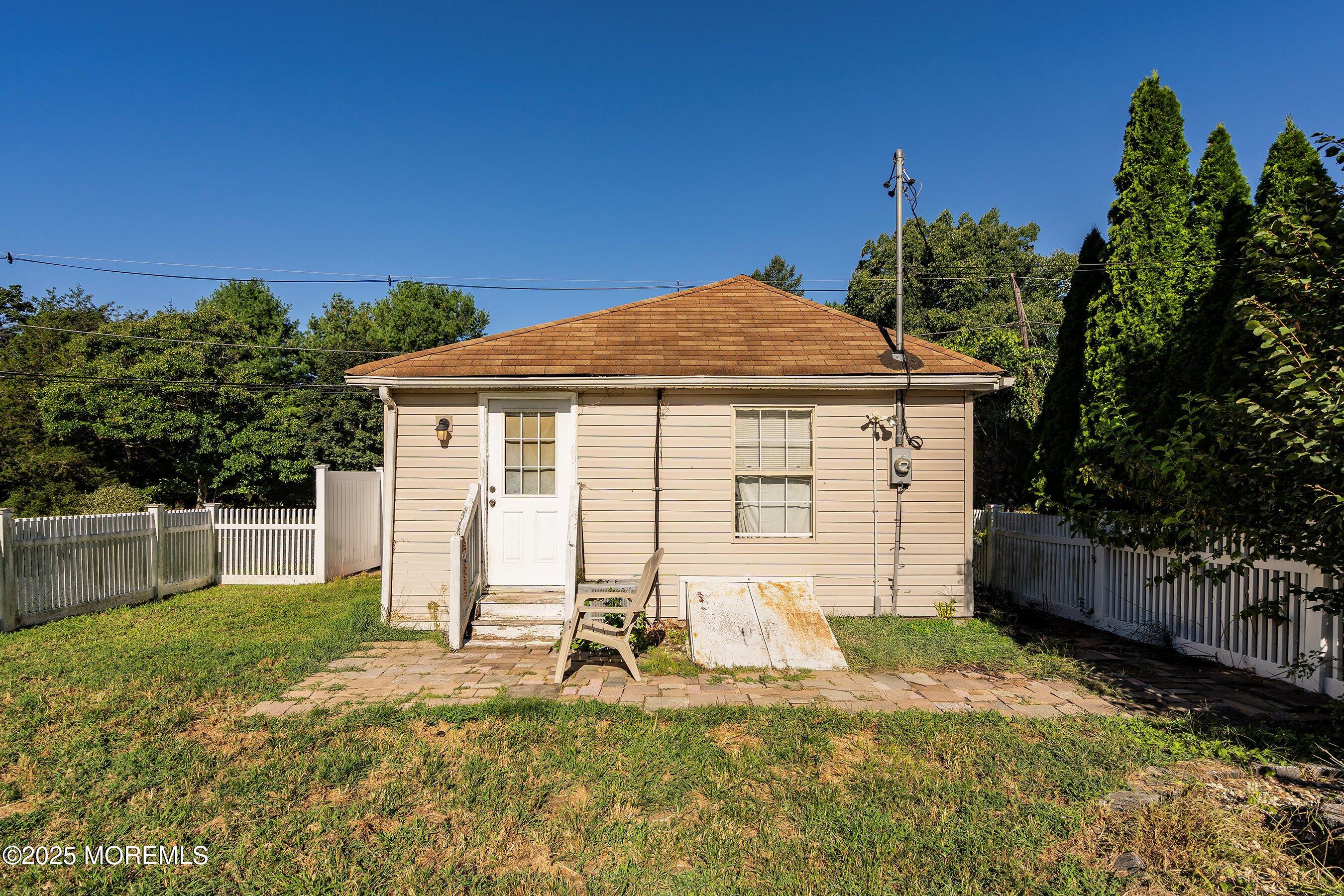 29 Ford Road Howell, NJ 07731 - Photo 2 of 19 a front view of a house with a yard