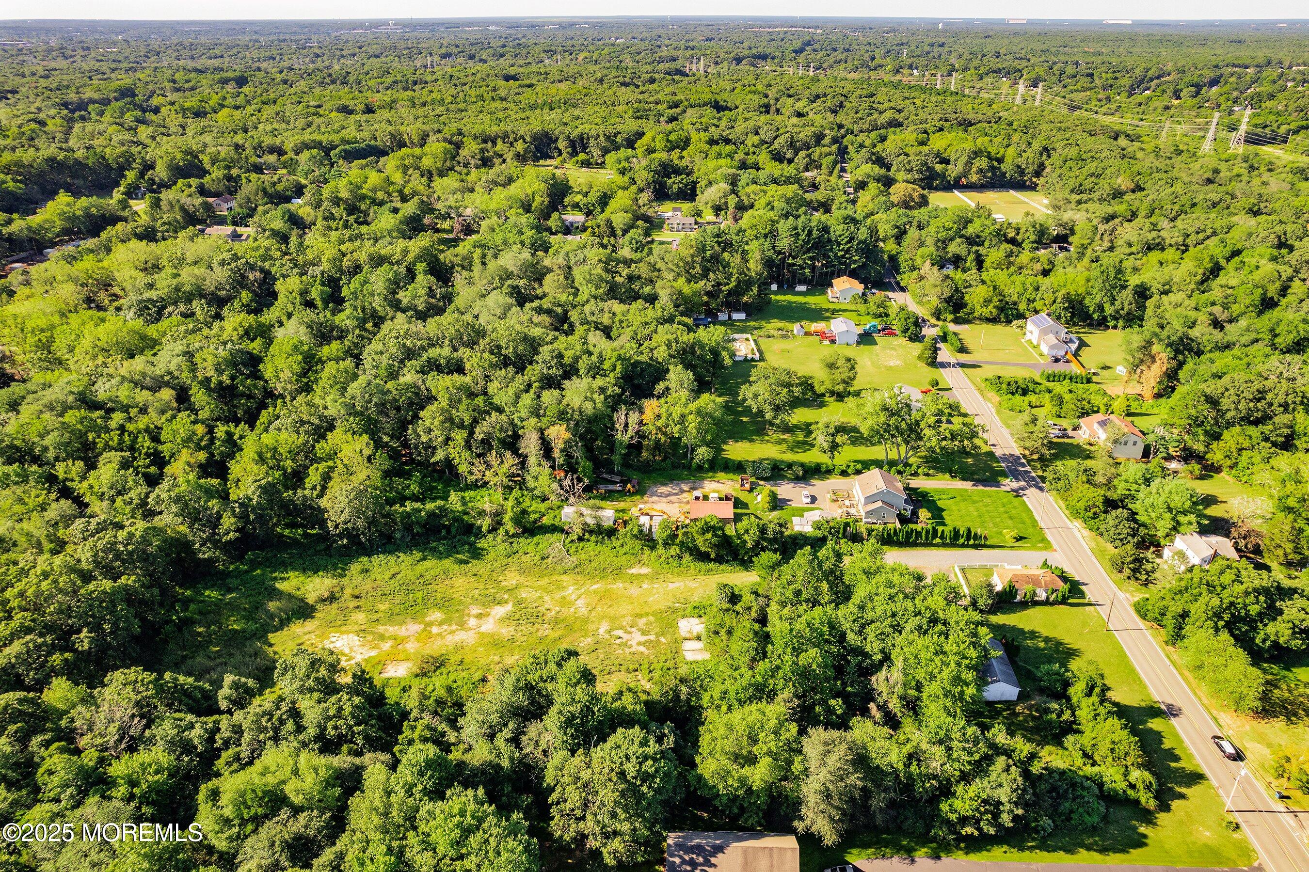 29 Ford Road Howell, NJ 07731 - Photo 10 of 19 an aerial view of residential houses with outdoor space and trees
