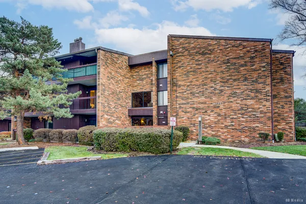 a brick building with a yard