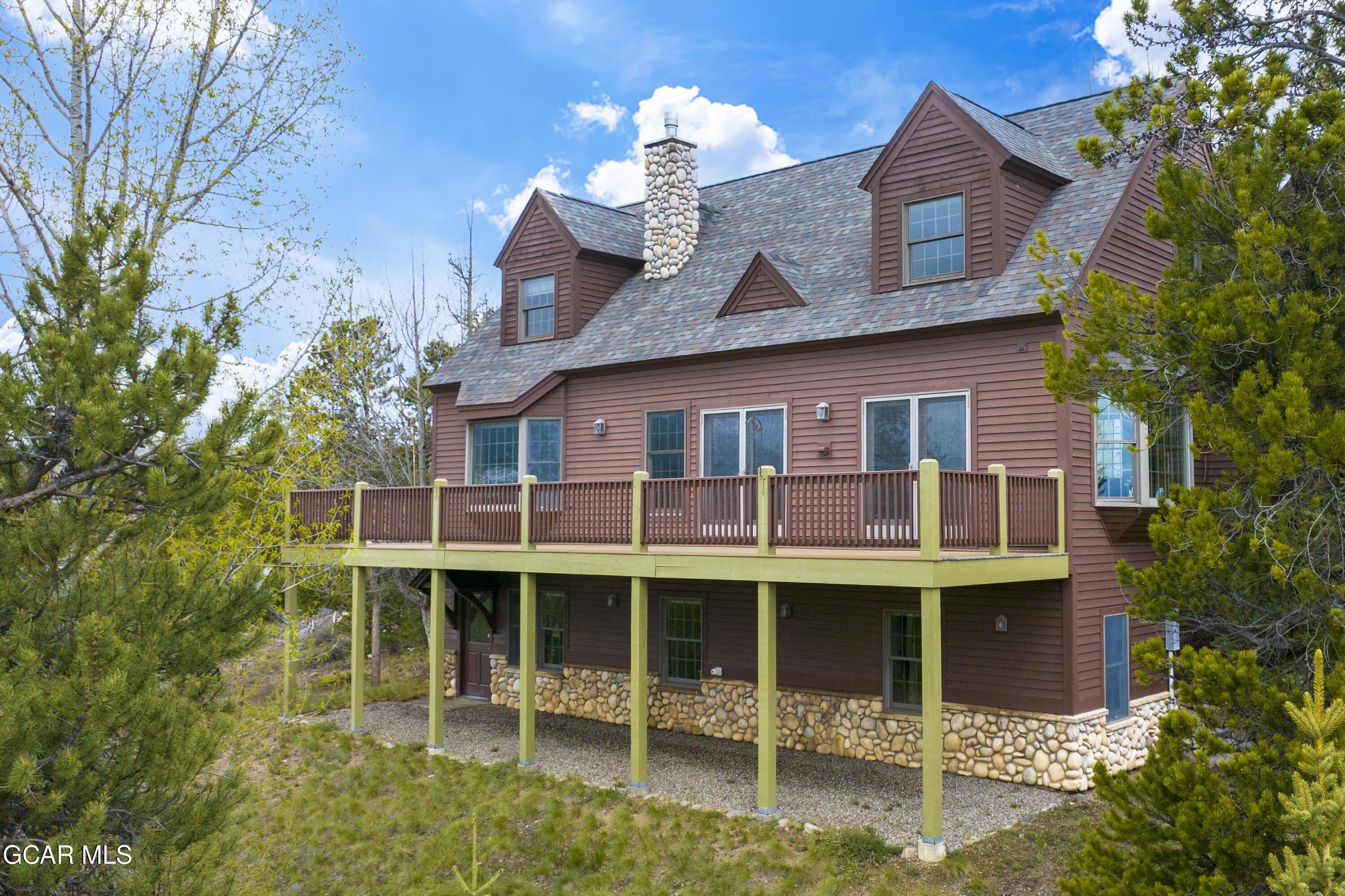 400 Ridge Road Tabernash, CO 80478 - Photo 42 of 50 a front view of a house with a porch
