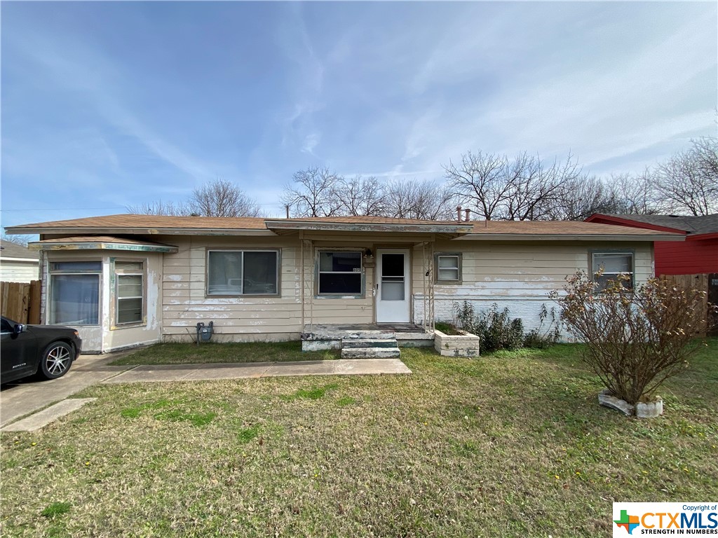 a view of a house with a garden