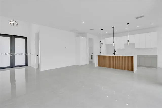 a view of a room with storage and utility room