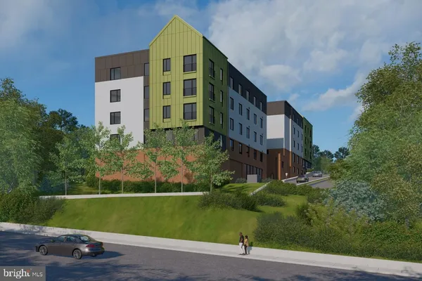 a view of a building along the street