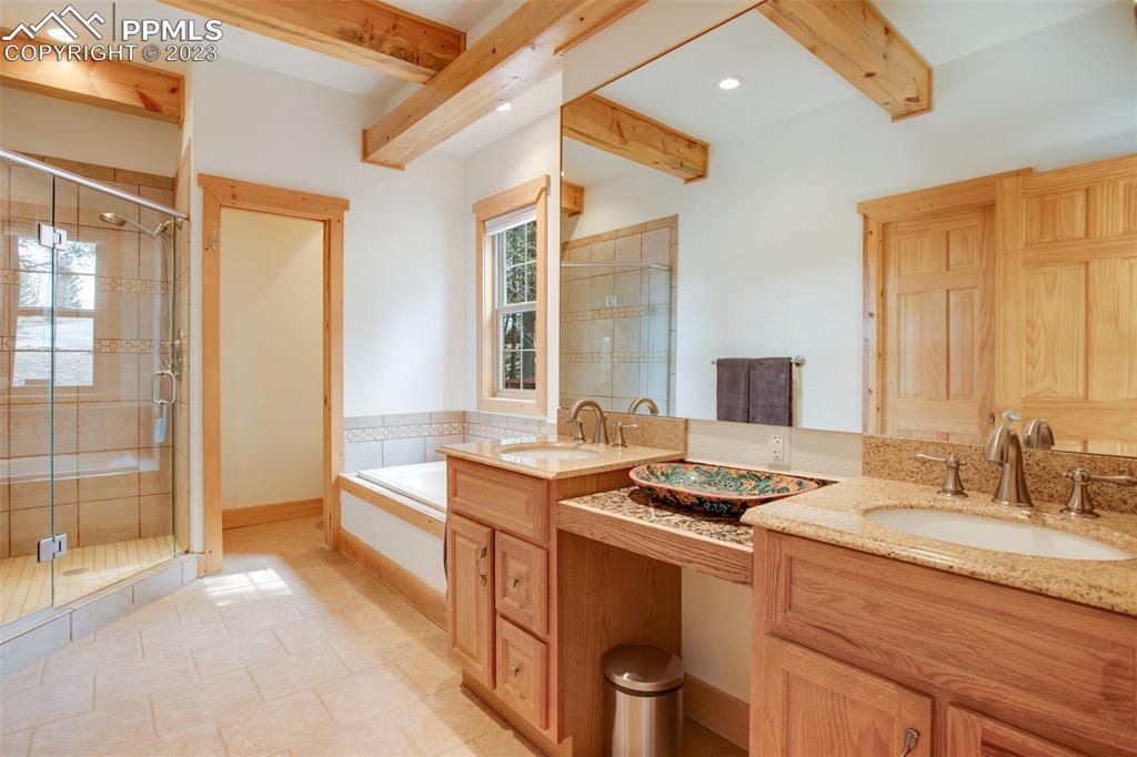 1201 County Road 512 Divide, CO 80814 - Photo 23 of 43 a kitchen with stainless steel appliances granite countertop a sink stove and cabinets