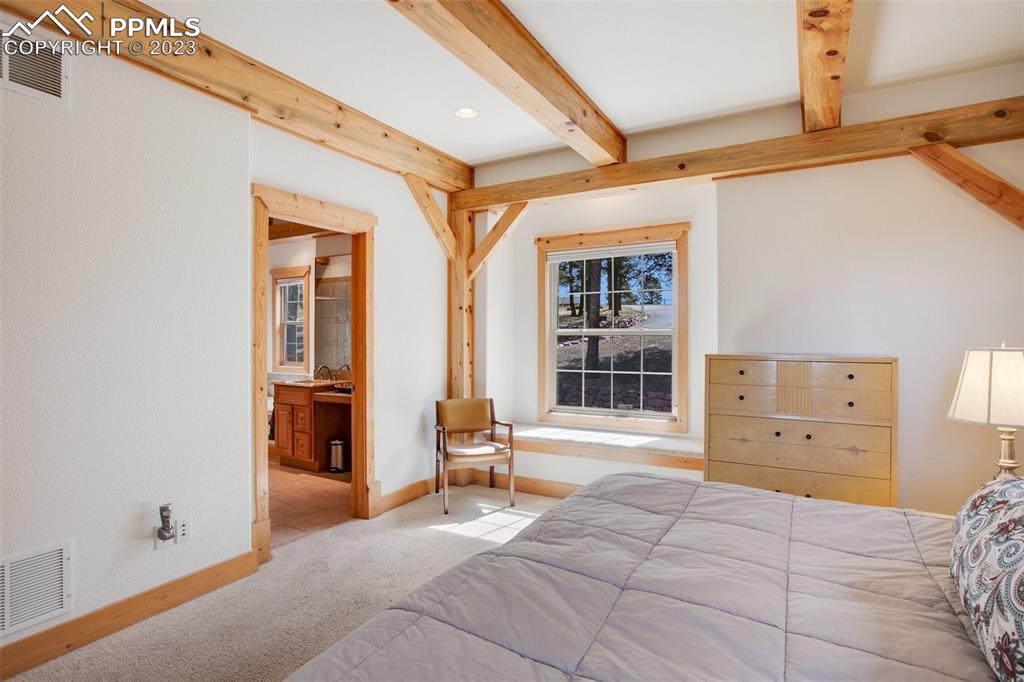 1201 County Road 512 Divide, CO 80814 - Photo 25 of 43 a view of a bedroom with furniture and windows