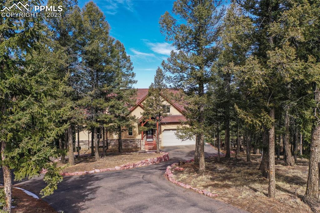 1201 County Road 512 Divide, CO 80814 - Photo 3 of 43 a view of a town with large trees