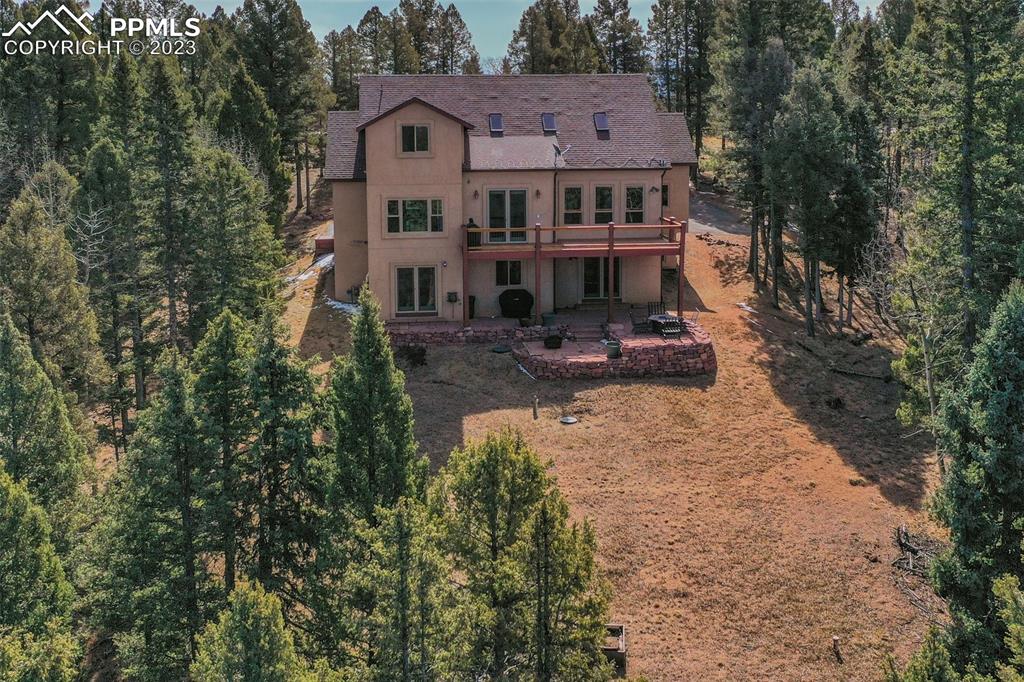 1201 County Road 512 Divide, CO 80814 - Photo 7 of 43 an aerial view of a house with a yard