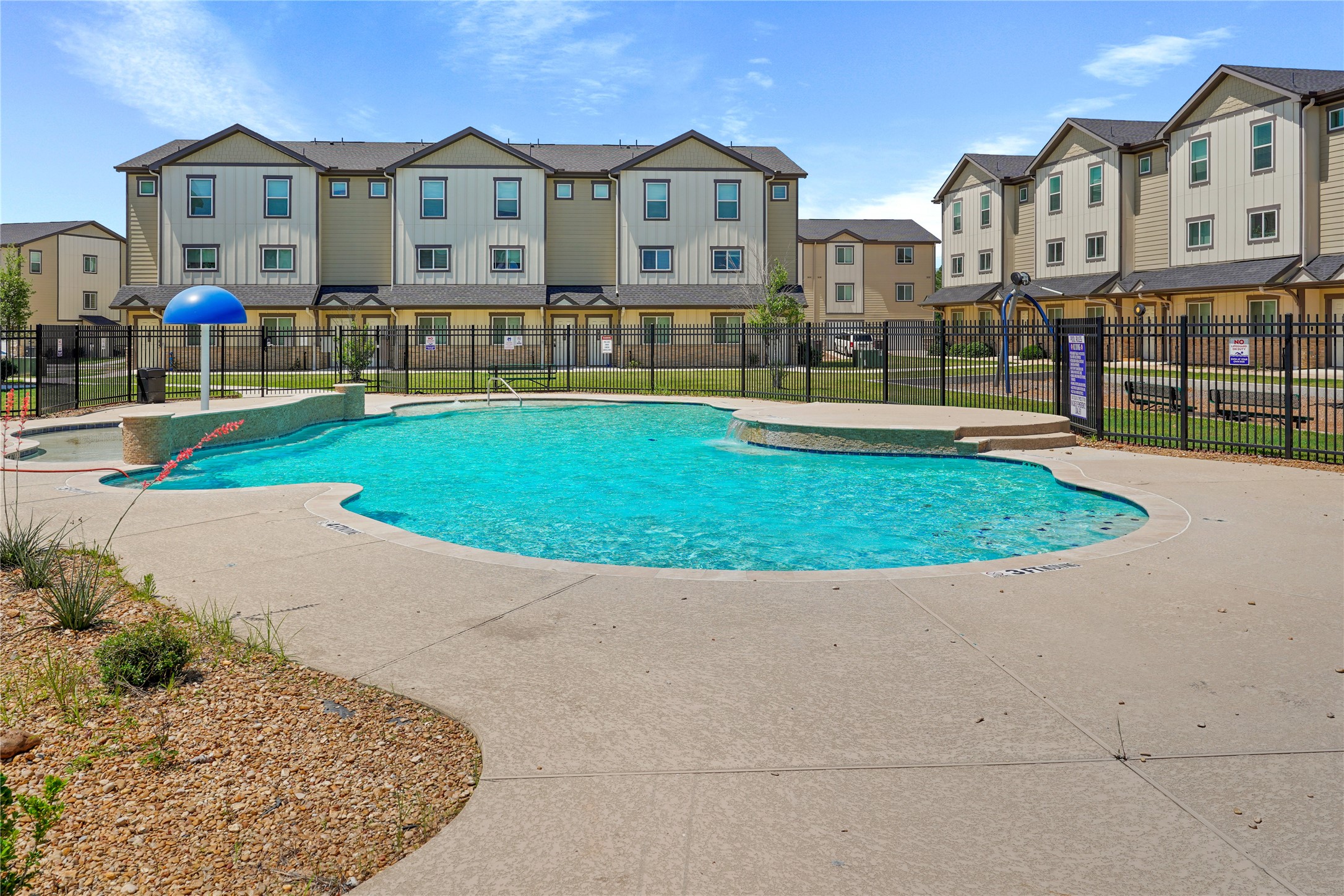 12603 Telge Road, Unit 7L Cypress, TX 77429 - Photo 11 of 20 a view of multiple houses with a yard