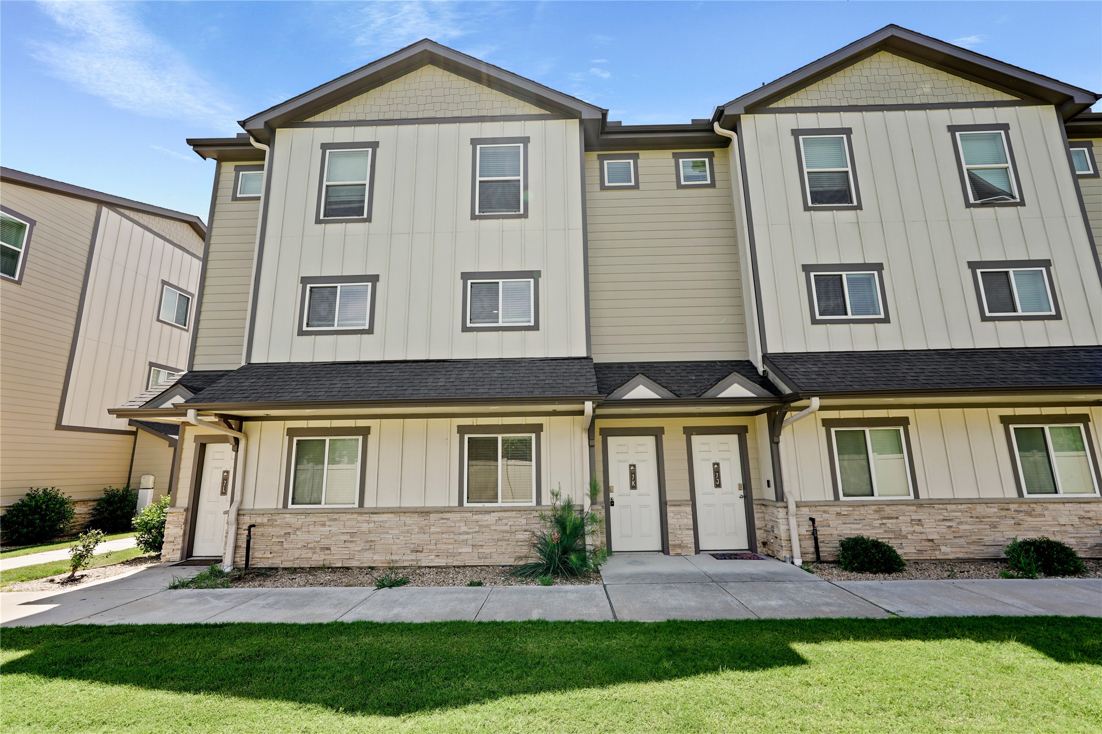 12603 Telge Road, Unit 7L Cypress, TX 77429 - Photo 15 of 20 a front view of a house with a yard
