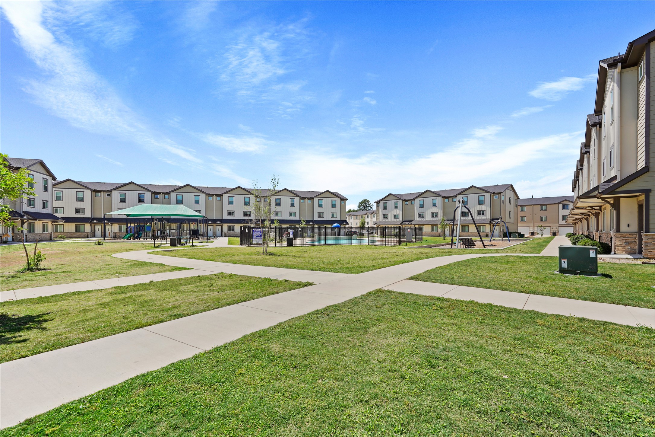 12603 Telge Road, Unit 7L Cypress, TX 77429 - Photo 18 of 20 a view of building with outdoor space