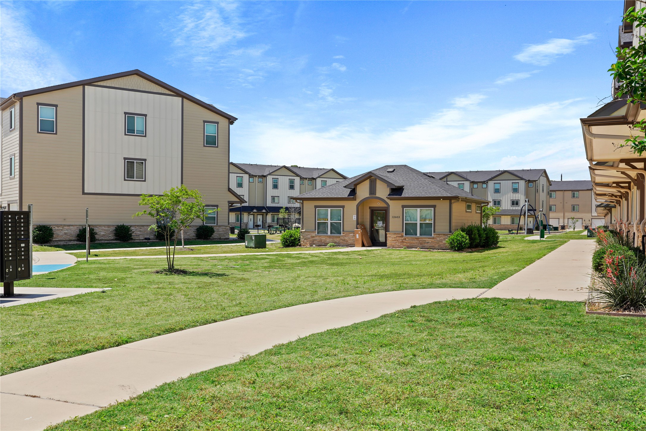 12603 Telge Road, Unit 7L Cypress, TX 77429 - Photo 19 of 20 a front view of a house with a yard